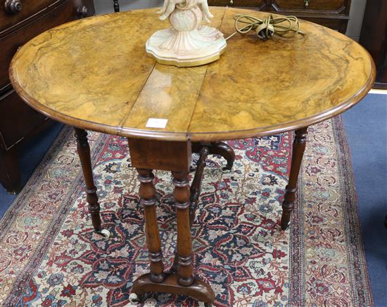 A Victorian burr walnut Sutherland table, W.83cm